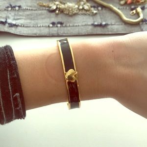 Gold and black enamel Kate Spade bangle